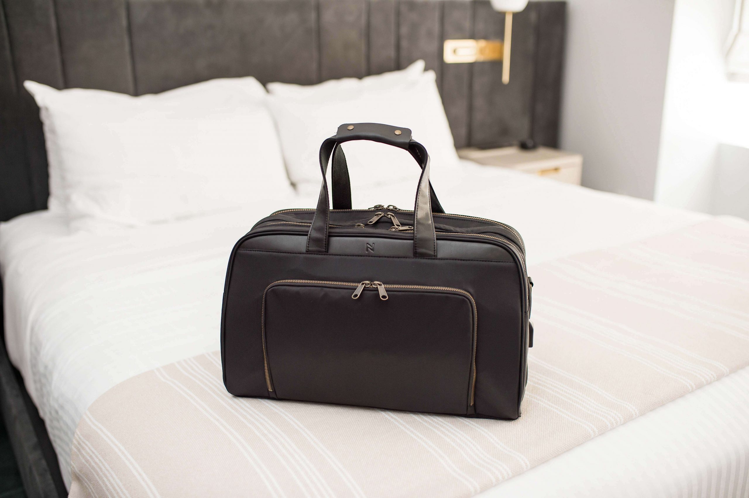 The best collection of black luxury travel bags 🛄⁠ Premium vegan