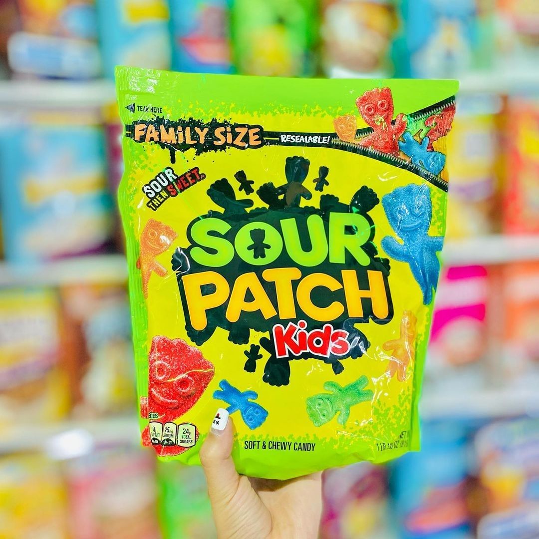 Person holding Sour Patch Kids pack