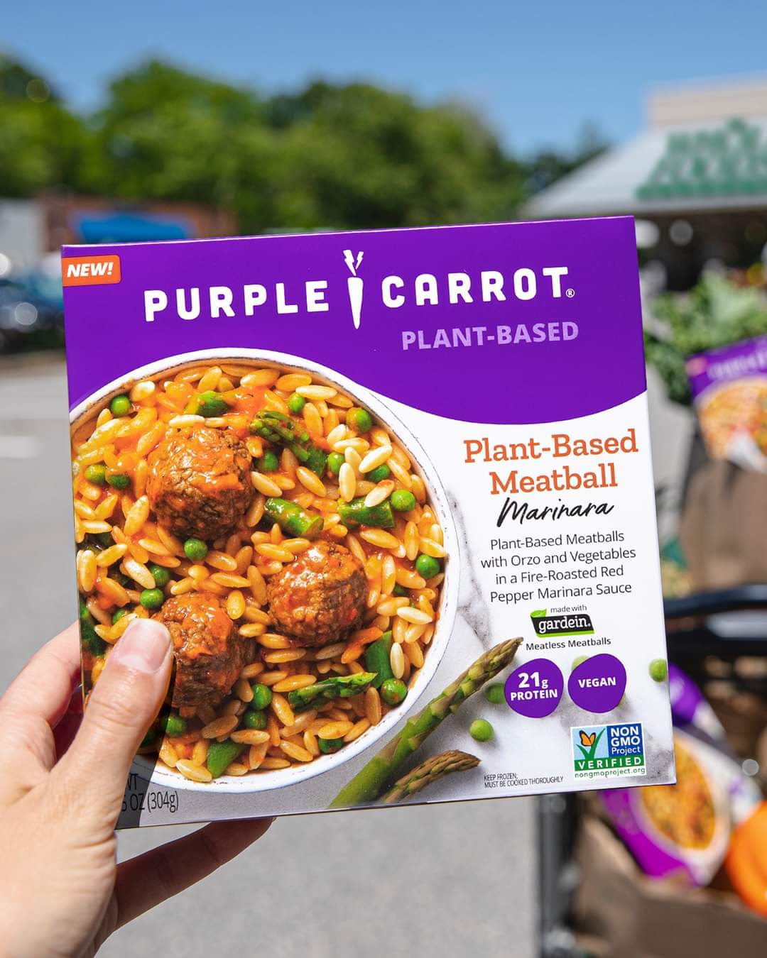 Person holding Purple Carrot meal