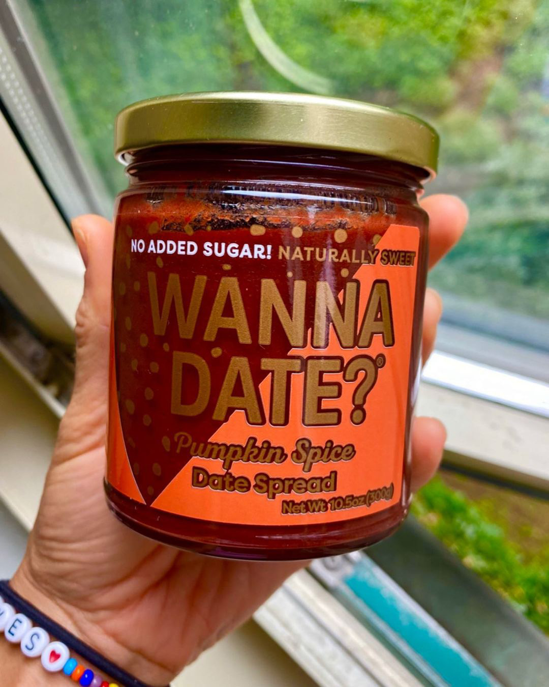Person holding Wanna Date? pumpkin spice date spread