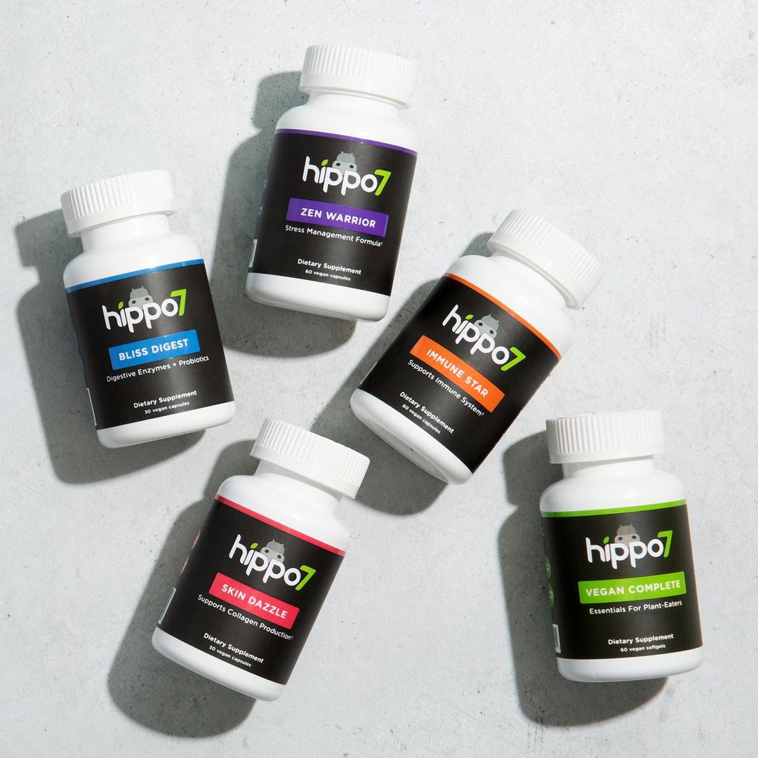 Hippo7 vitamin bottles spread out