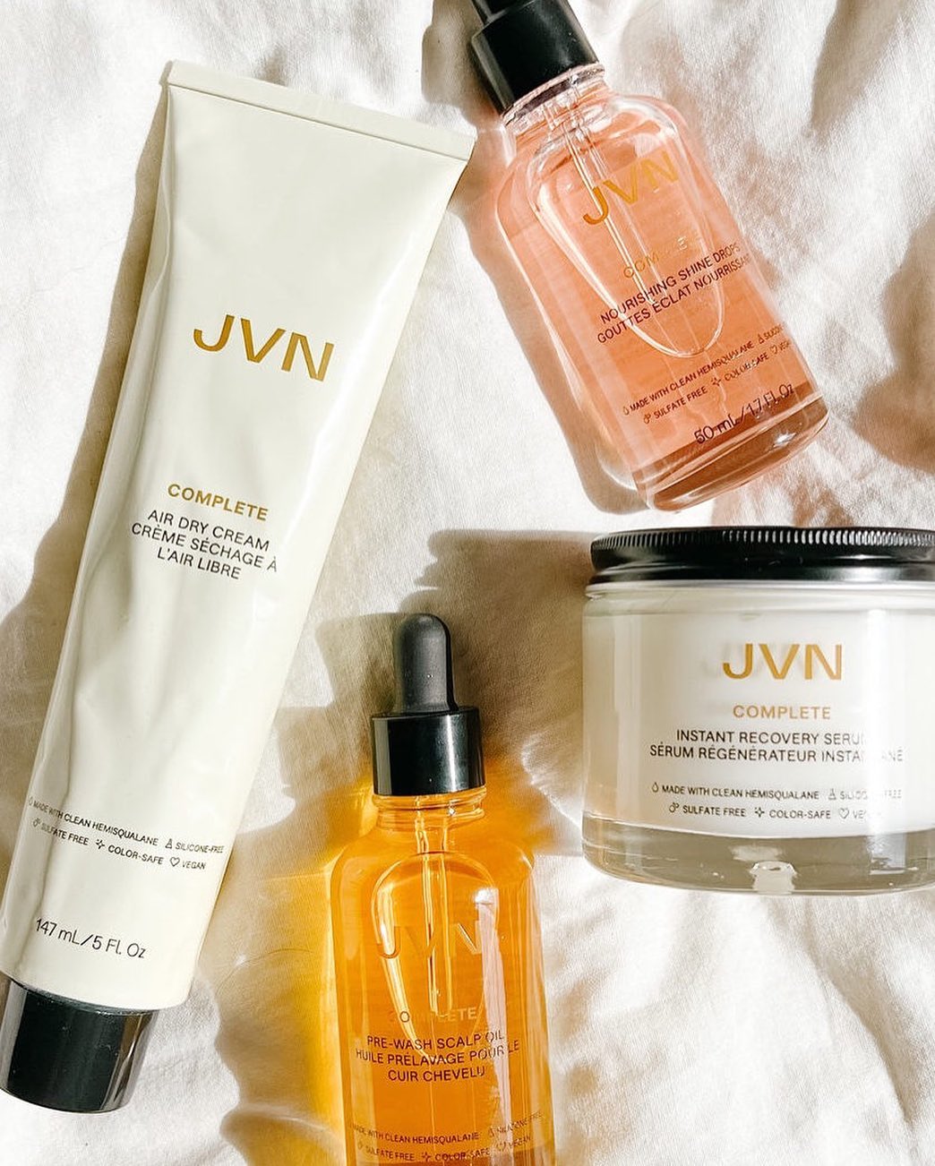 JVN Hair products on sheet