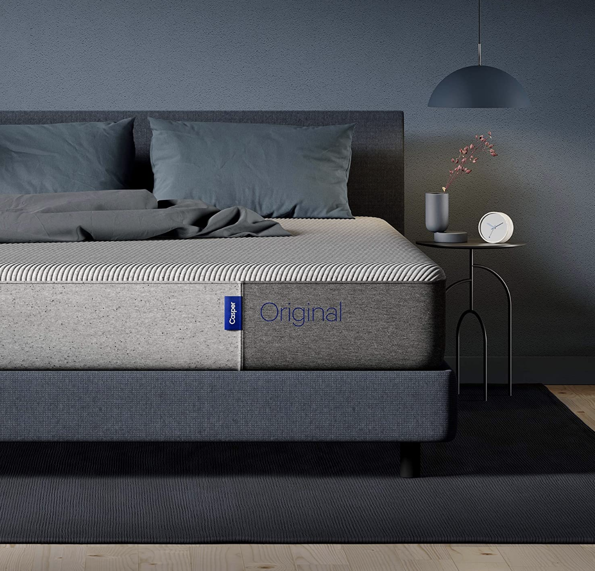 Casper mattress with pillows on bed