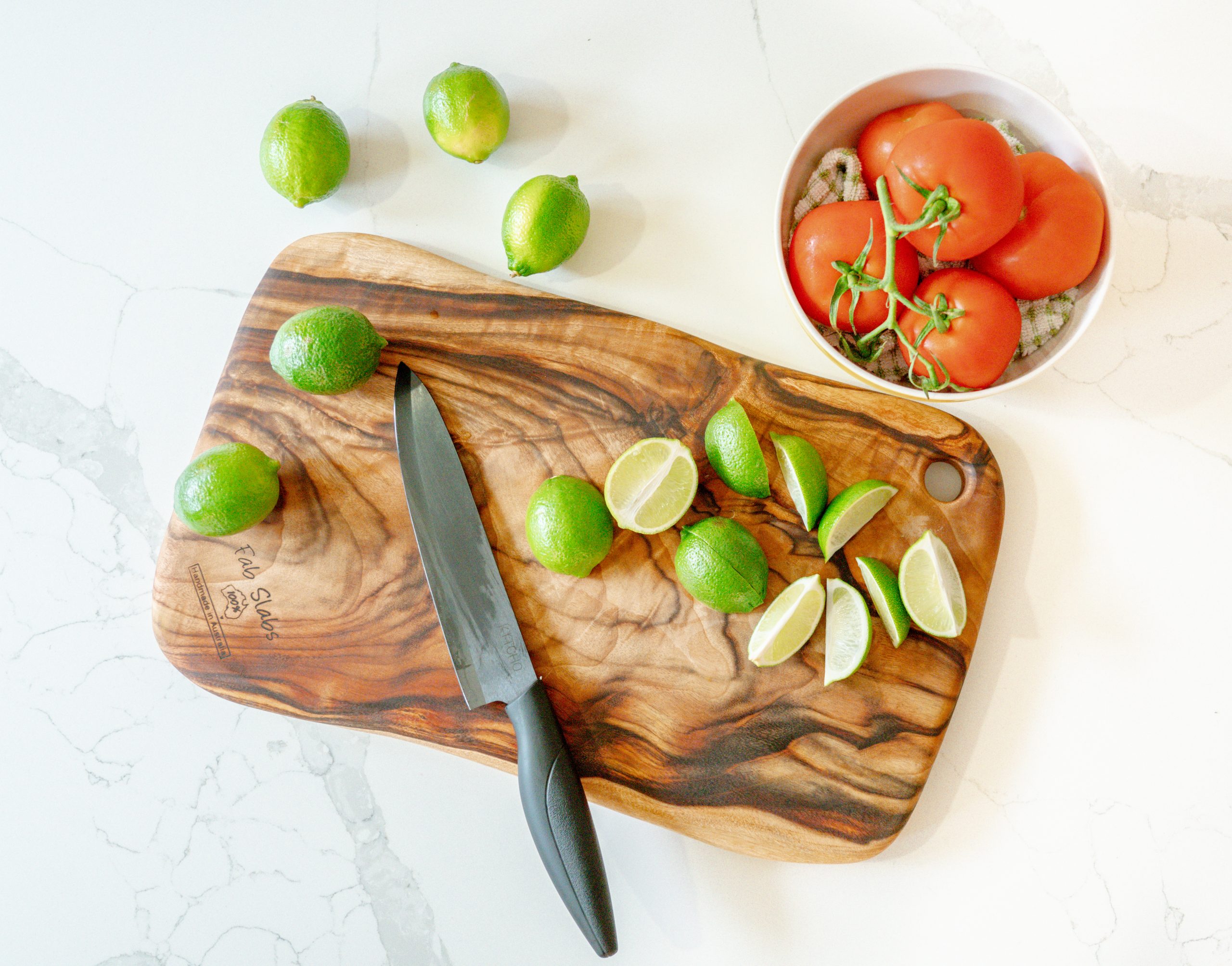 Fab Slabs cutting board with limes cut