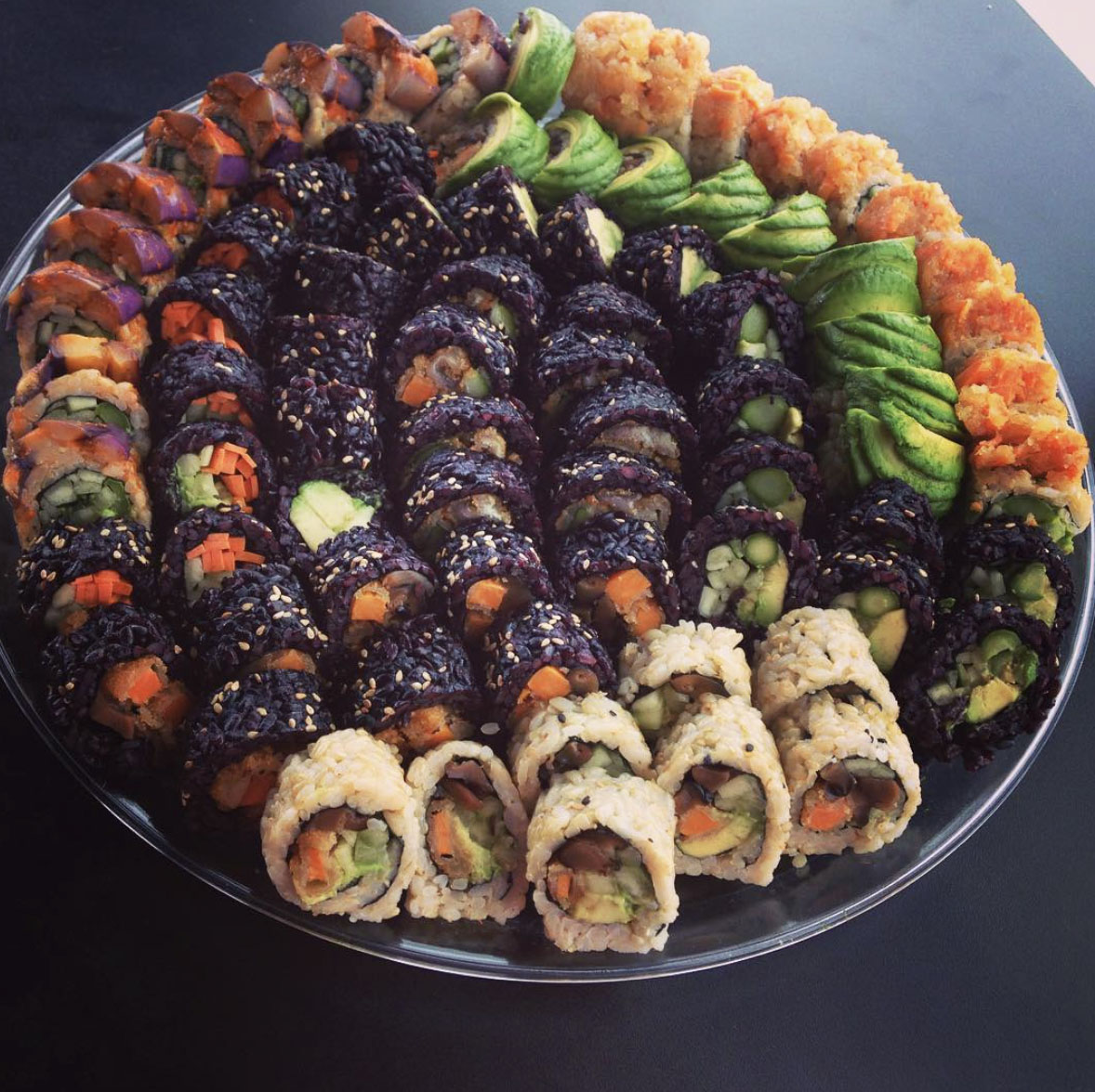 Plate full of vegan sushi rolls from Hamachi
