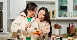 Kelly Mi Li and her mom Emily cooking in the kitchen