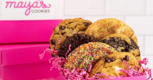 Maya's Cookies in box with confetti on counter