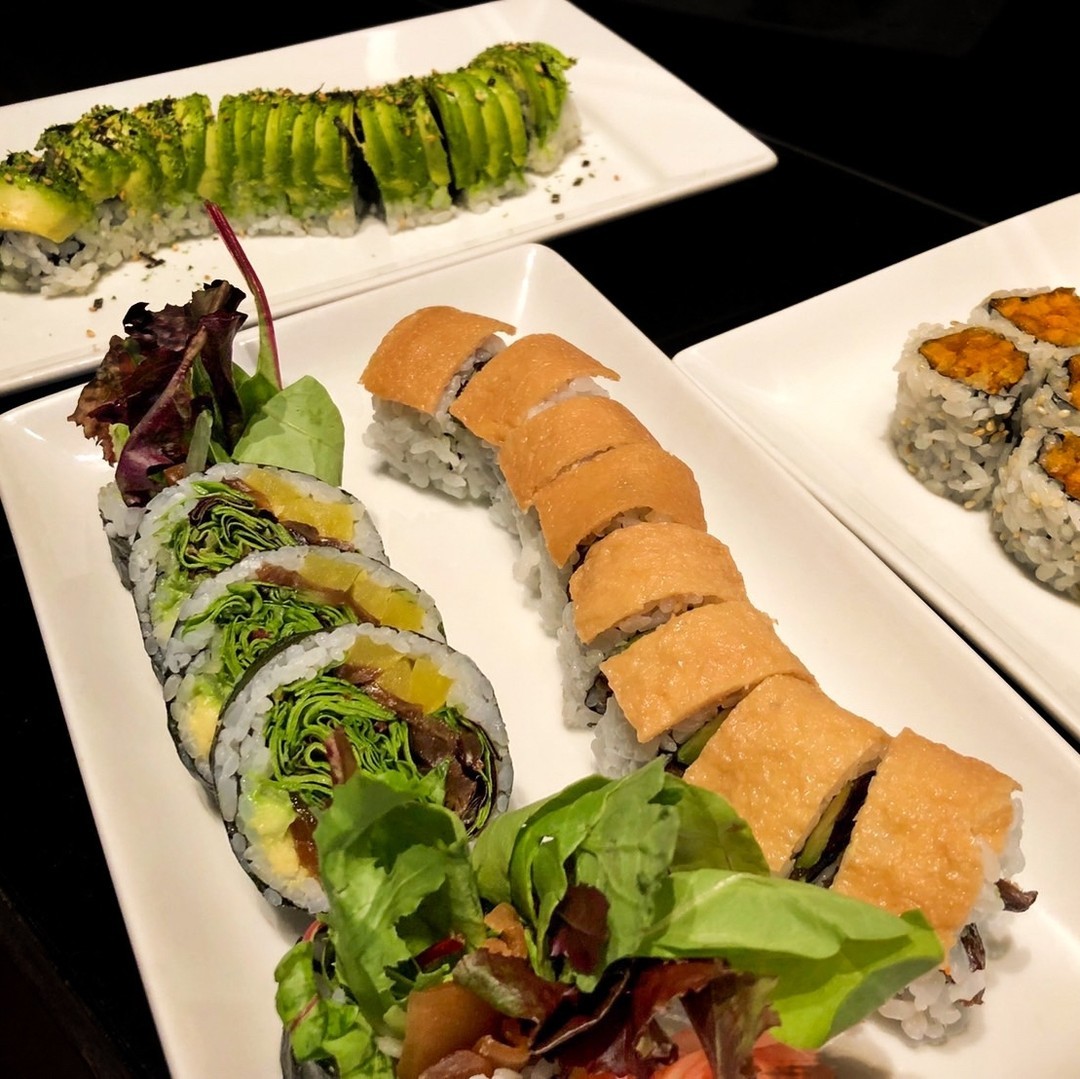 Seadog Sushi bar vegan rolls on multiple plates