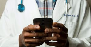 Doctor holding phone