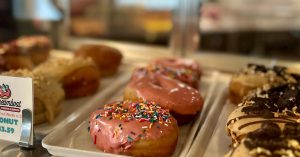 Dreamboat Donuts behind glass