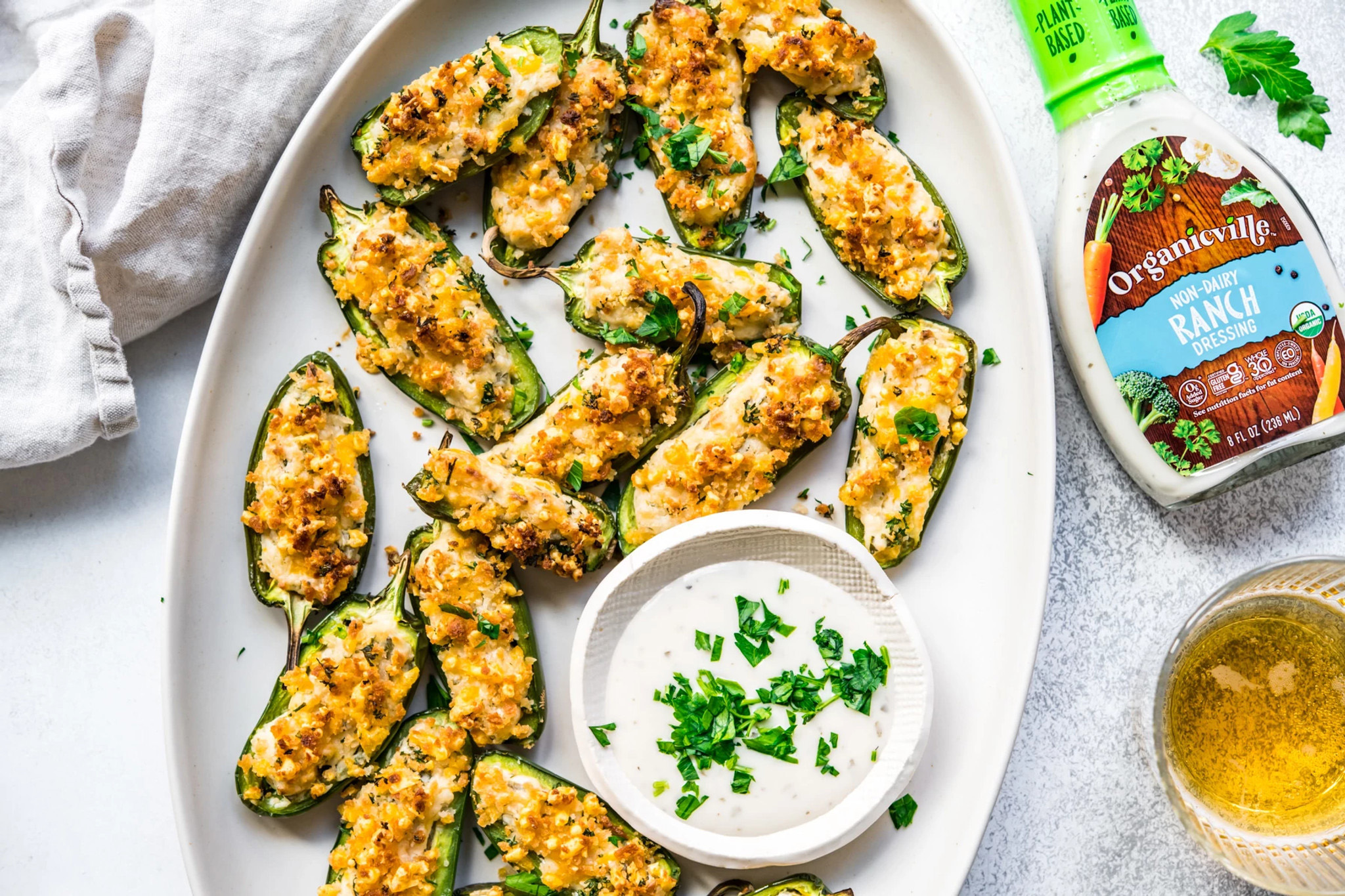 Organicville ranch in bowl with vegan jalepeno poppers