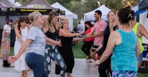 People dancing at VegFest SCV