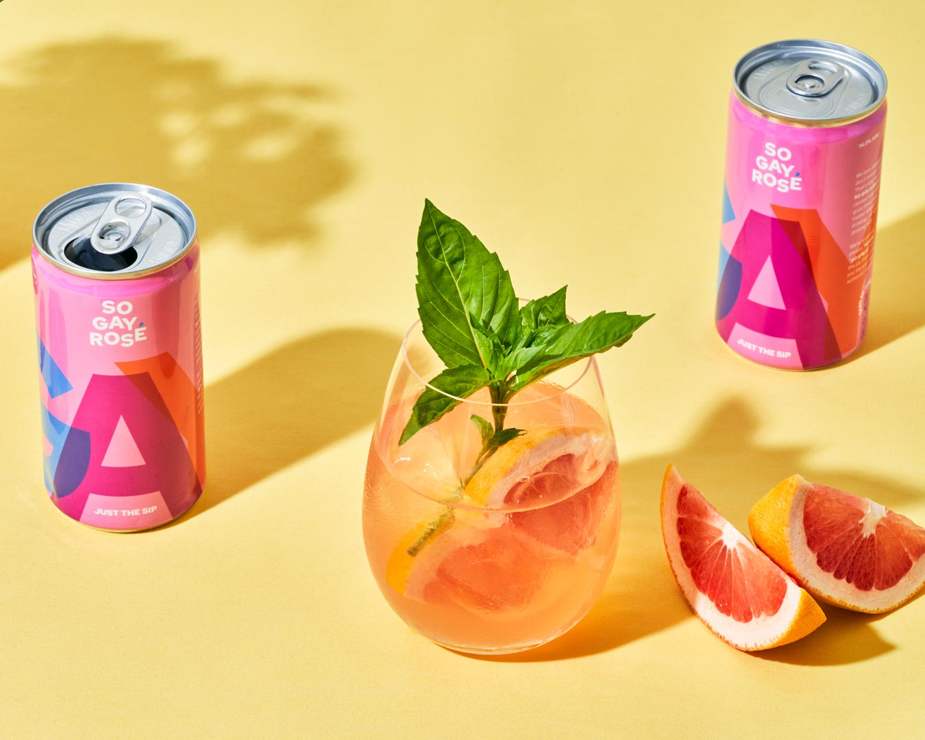 So Gay Rosè cans with drink and fruit