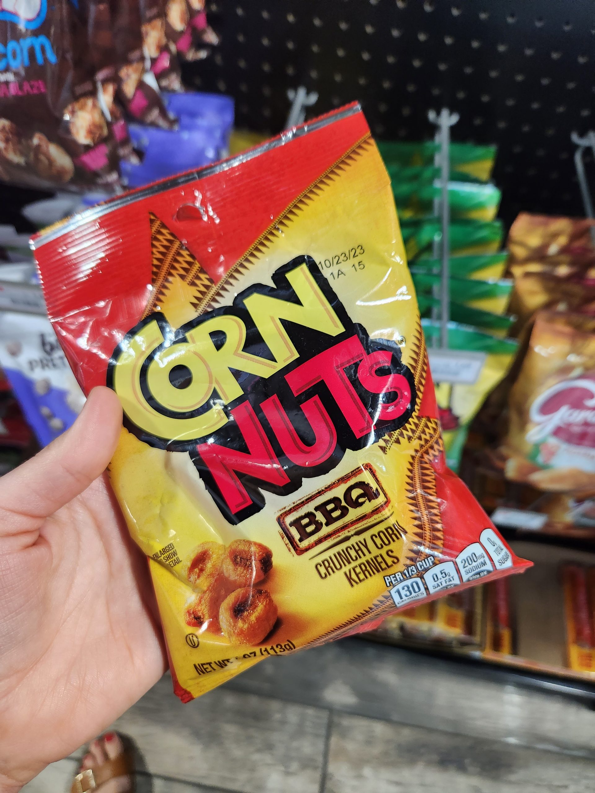 Person holding Corn Nuts