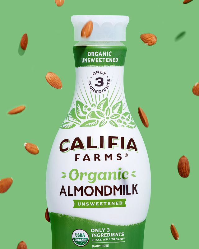 Califia Farms Almond Milk with almonds falling