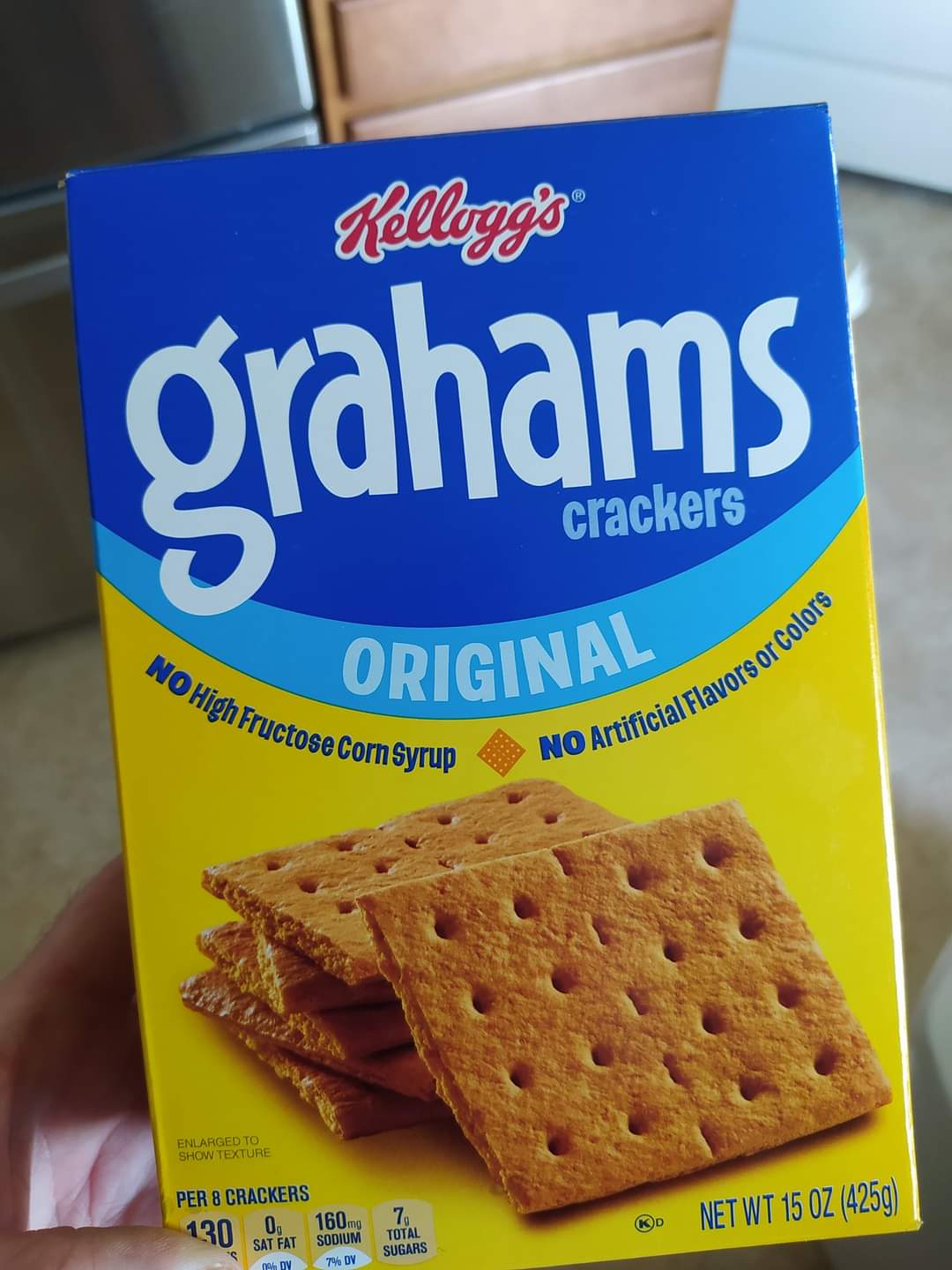 Person holding Kellogg Graham Crackers