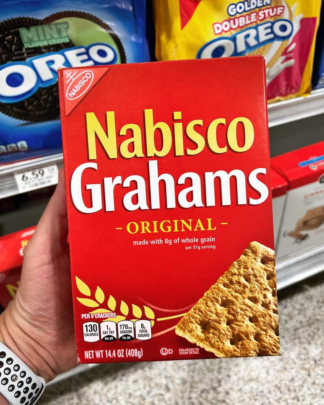 Person holding Nabisco Graham Crackers