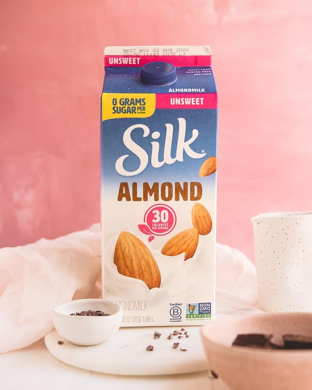 Silk Almond Milk with chocolate on table