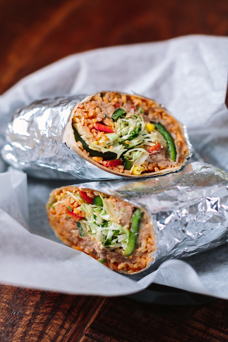 Vegan burrito in tray from Spanglish