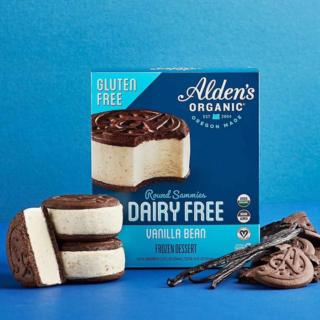 Alden’s Round Sammies in package with chocolate and cookies surrounding