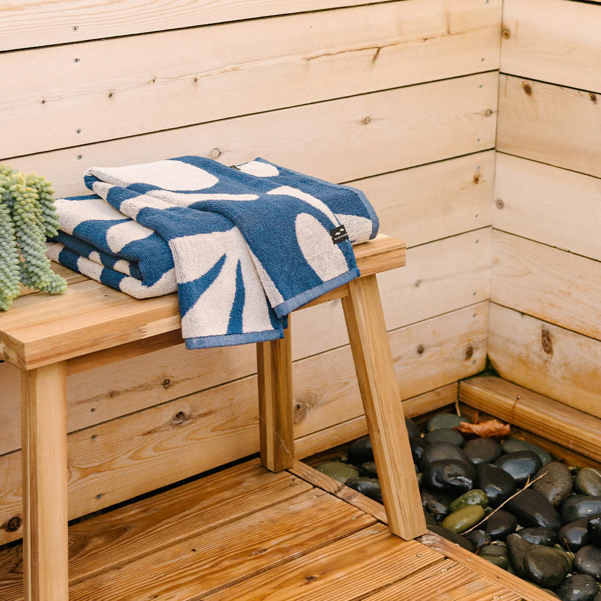 Slowtide towel on bench in sauna