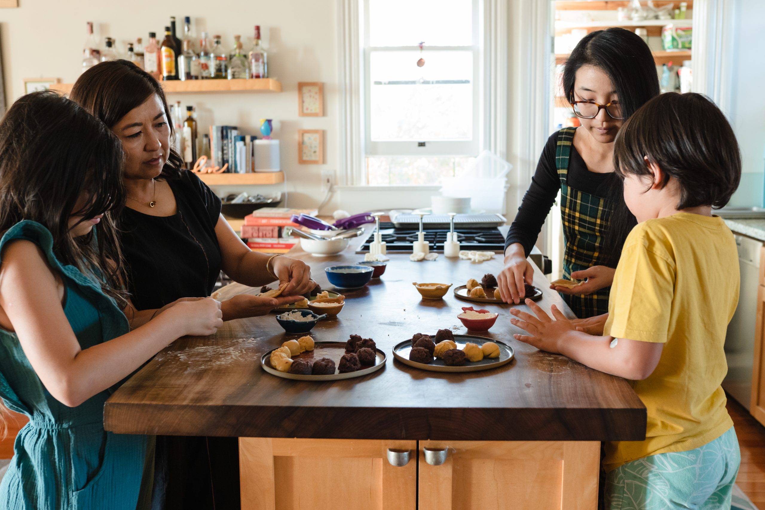 Founder Annie Wang and Family making cookies
