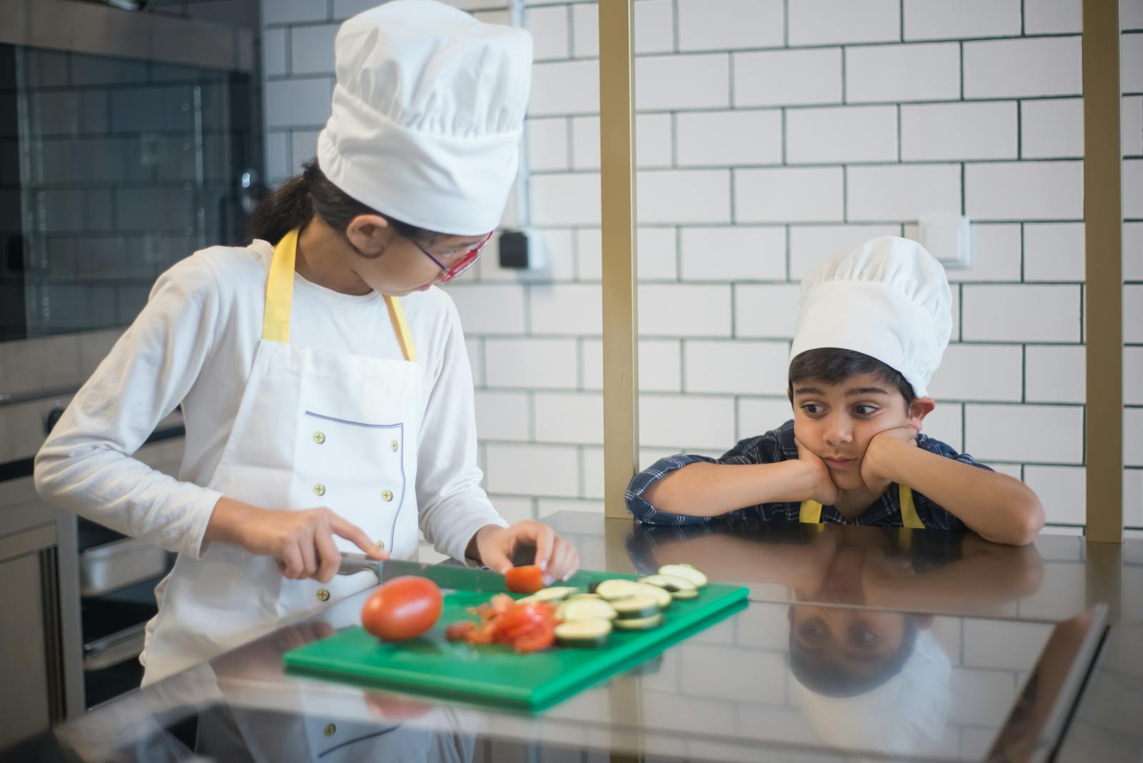 children cooking vegetables