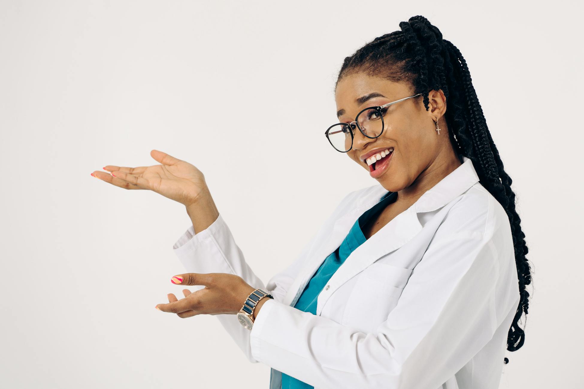 Professional female doctor with glasses, confidently presenting on a white background.