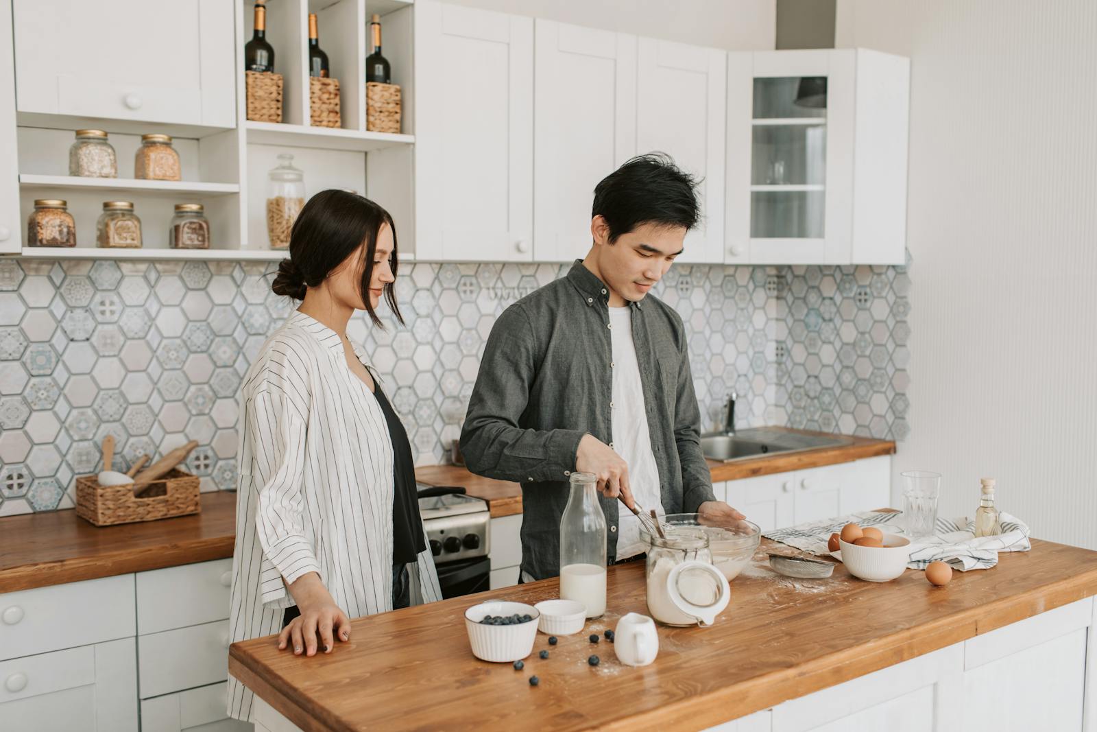 couple cooking kitchen