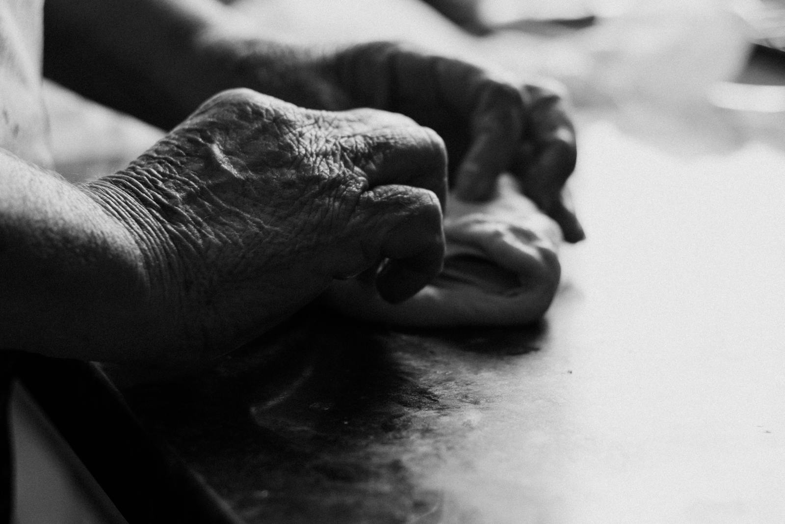 elderly hands tablecloth