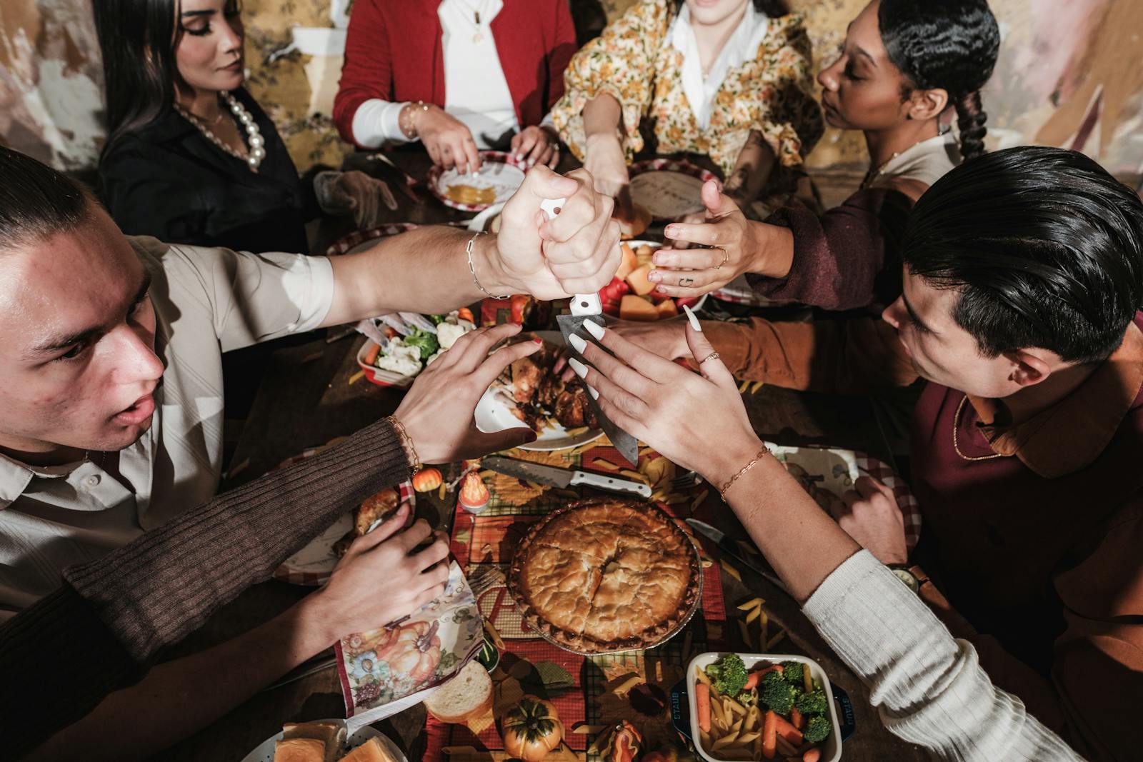 friends sharing dinner plates