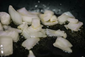 People who cook without recipes aren't more talented. They've just spent enough time failing in the kitchen that their hands learned to trust what their brain hasn't fully articulated.