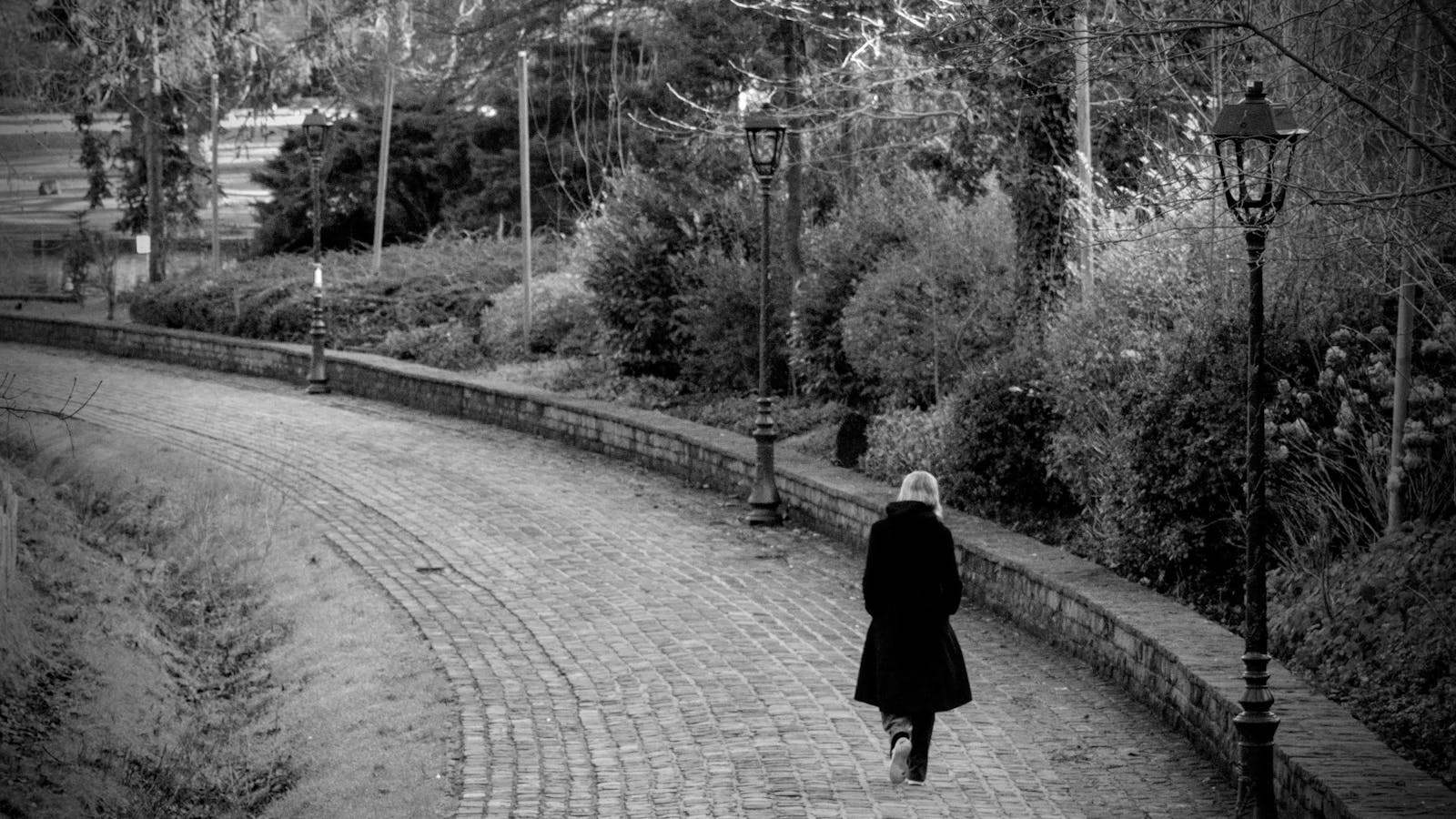 person walking alone park