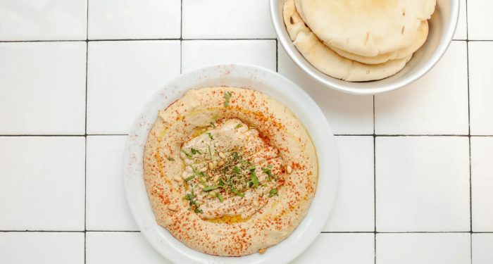 Sheet-Pan Cauliflower Shawarma With Lemon Tahini and Warm Pita in 30 Minutes