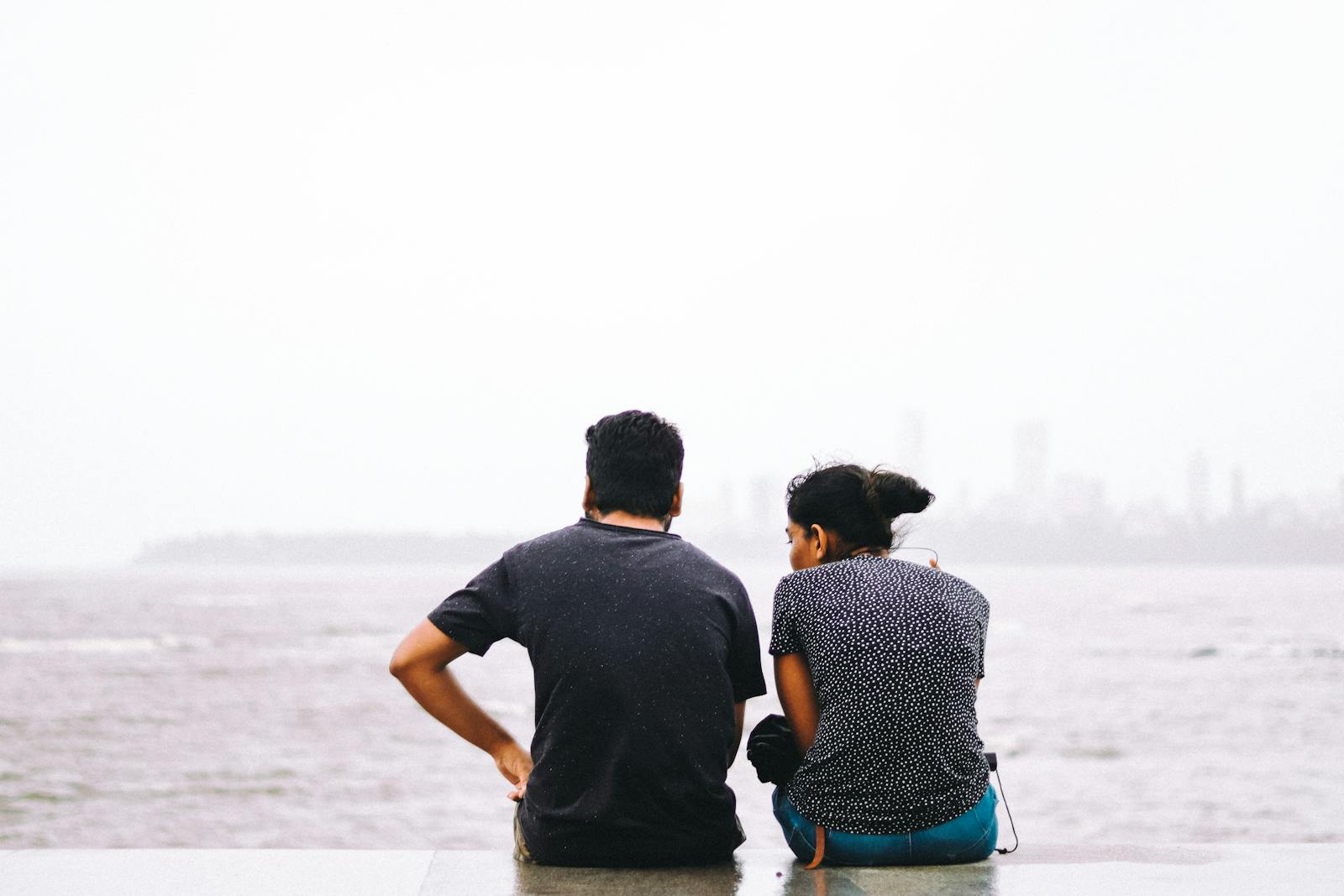 two people quiet conversation
