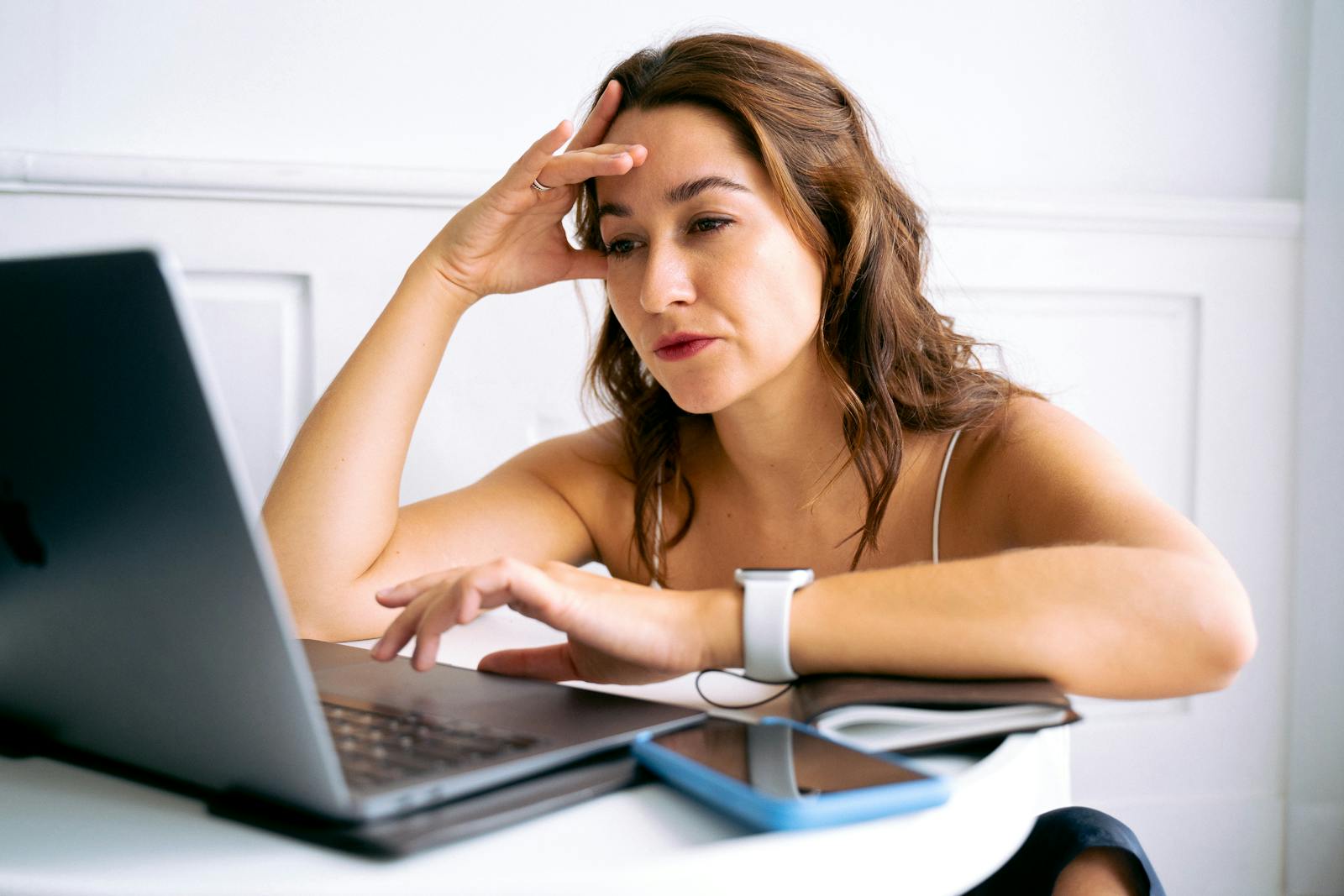 woman laptop overwhelmed tabs