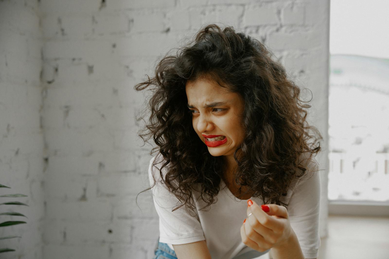 woman receiving award uncomfortable