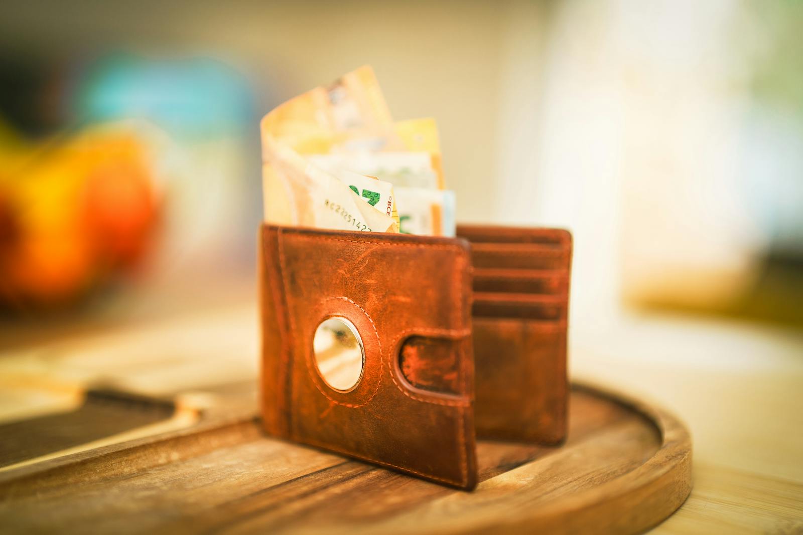 worn leather wallet table
