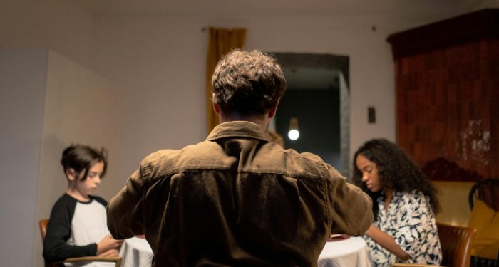 Adults who can sit through a long silence at the dinner table without rushing to fill it grew up in homes where silence wasn't dangerous, and that single ordinary fact shaped more of their adult relationships than any of them realise