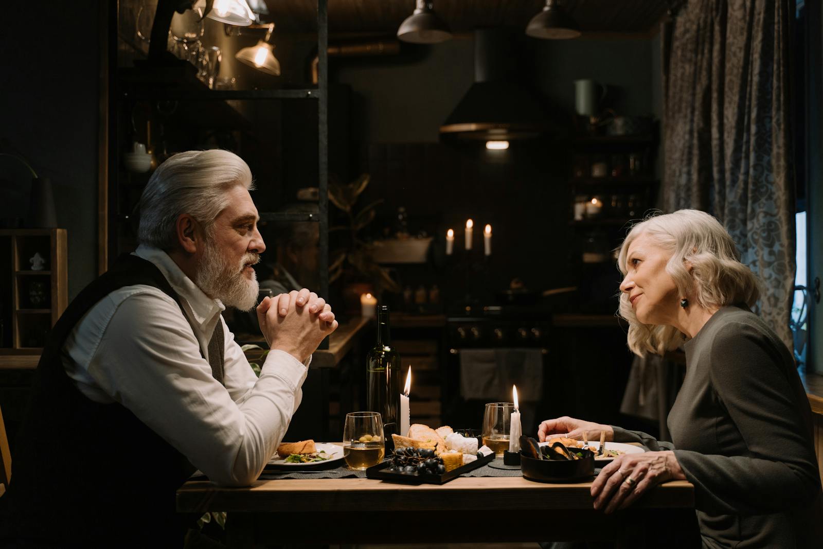 older couple talking dinner