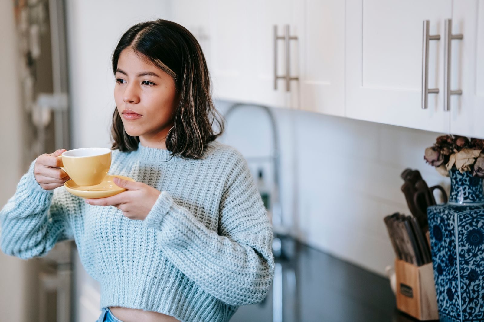 forties woman kitchen morning