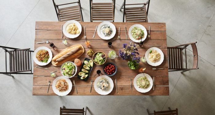 There's a particular kind of loneliness that arrives the first time you cook a full meal for yourself after decades of cooking for a family, and the people who handle it best aren't the ones who keep the recipes the same